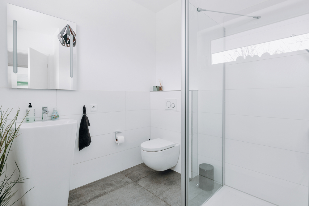 Einzigartiges Architektenhaus für Ihre Familie in Brietlingen - Gästebad