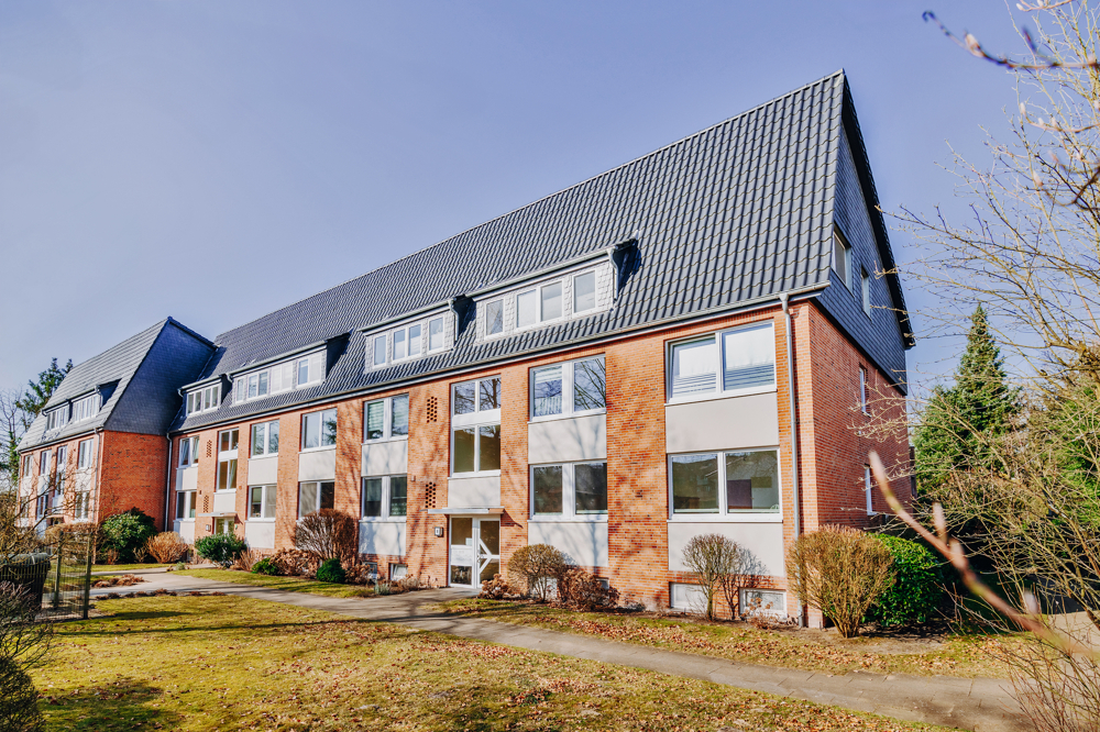 Helle 3-Zimmer-Wohnung mit Wintergarten, Balkon und Blick ins Grüne - Hausansicht
