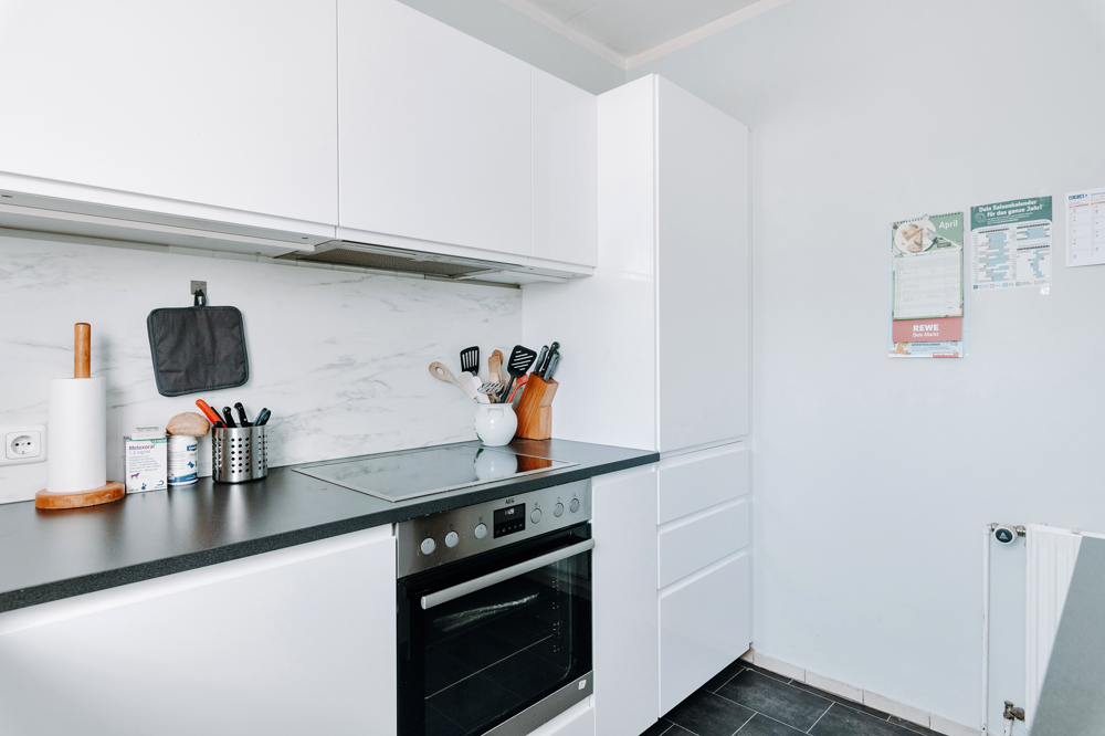 Charmantes Reihenmittelhaus mit sonnigem Garten - Küche mit modernen Elektrogeräten