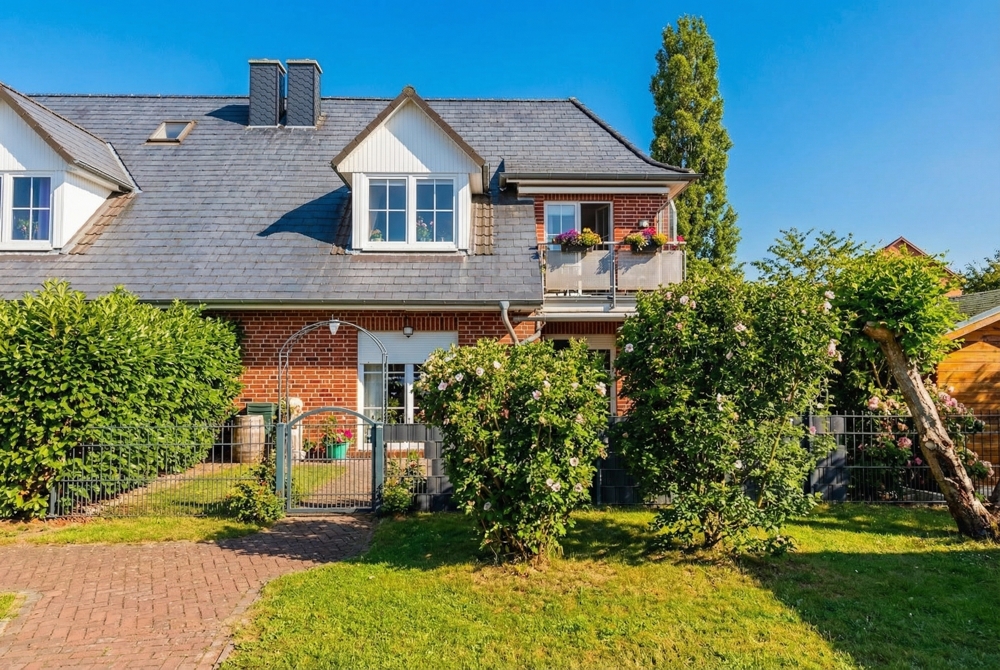 Einziehen und Wohlfühlen. Dachgeschoss-Juwel im Maisonette-Stil - Außenansicht